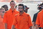 STILLWATER, OK - SEPTEMBER 05:  Head coach Mike Gundy of the Oklahoma State Cowboys walks the sidelines during the college football game against the Georgia Bulldogs at Boone Pickens Stadium on September 5, 2009 in Stillwater, Oklahoma.  The Cowboys defeated the Bulldogs 24-10.  (Photo by Christian Petersen/Getty Images)