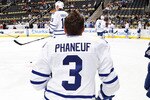 PITTSBURGH - OCTOBER 13:  Dion Phaneuf #3 of the Toronto Maple Leafs stretches on the ice before a game against the Pittsburgh Penguins on October 13, 2010 at Consol Energy Center in Pittsburgh, Pennsylvania.  (Photo by Jamie Sabau/Getty Images)