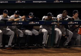 ARLINGTON, TX - OCTOBER 22: The bench of the New York Yankees looks on from the dugout in Game Six of the ALCS against the Texas Rangers during the 2010 MLB Playoffs at Rangers Ballpark in Arlington on October 22, 2010 in Arlington, Texas. (Photo by Ronald Martinez/Getty Images)