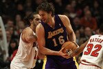 CHICAGO, IL - DECEMBER 10: Pau Gasol #16 of the Los Angeles Lakers moves against Joakim Noah #13 of the Chicago Bulls at the United Center on December 10, 2010 in Chicago, Illinois. The Bulls defeated the Lakers 88-84. NOTE TO USER: User expressly acknowledges and agrees that, by downloading and/or using this photograph, User is consenting to the terms and conditions of the Getty Images License Agreement. (Photo by Jonathan Daniel/Getty Images)