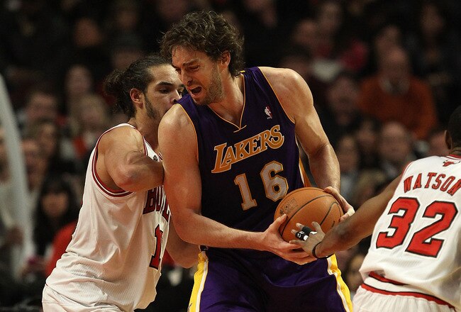 CHICAGO, IL - DECEMBER 10: Pau Gasol #16 of the Los Angeles Lakers moves against Joakim Noah #13 of the Chicago Bulls at the United Center on December 10, 2010 in Chicago, Illinois. The Bulls defeated the Lakers 88-84. NOTE TO USER: User expressly acknowledges and agrees that, by downloading and/or using this photograph, User is consenting to the terms and conditions of the Getty Images License Agreement. (Photo by Jonathan Daniel/Getty Images)