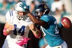 JACKSONVILLE, FL - OCTOBER 03:  Tight end Dallas Clark #44 of the Indianapolis Colts cannot hold onto a pass as he is defended by Anthony Smith #20 of the Jacksonville Jaguars at EverBank Field on October 3, 2010 in Jacksonville, Florida.  (Photo by Marc Serota/Getty Images)