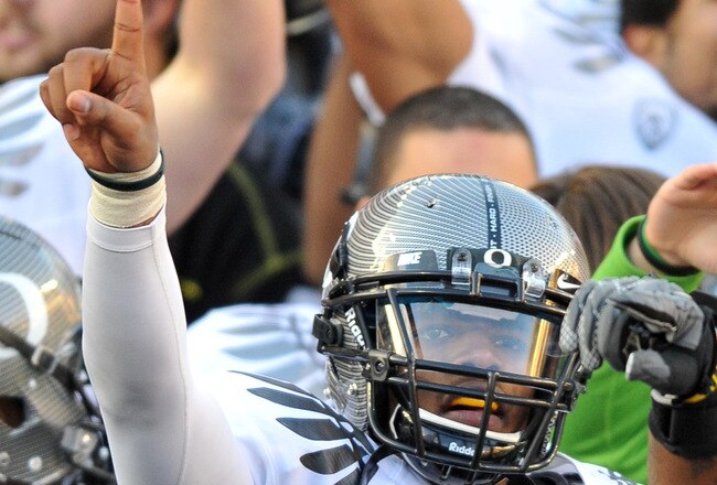 CORVALLIS, OR - DECEMBER 4: Quarterback Darron Thomas #1 of the Oregon Ducks signals to the fans in the stands after the game at Reser Stadium on December 4, 2010 in Corvallis, Oregon. he Ducks beat the Beavers 37-20 to likely go on the BCS Championship game at the Tostitos Bowl on January 10, 2011. (Photo by Steve Dykes/Getty Images)