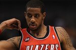 DALLAS, TX - DECEMBER 15:  LaMarcus Aldridge #12 of the Portland Trail Blazers at American Airlines Center on December 15, 2010 in Dallas, Texas. NOTE TO USER: User expressly acknowledges and agrees that, by downloading and or using this photograph, User is consenting to the terms and conditions of the Getty Images License Agreement.  (Photo by Ronald Martinez/Getty Images)