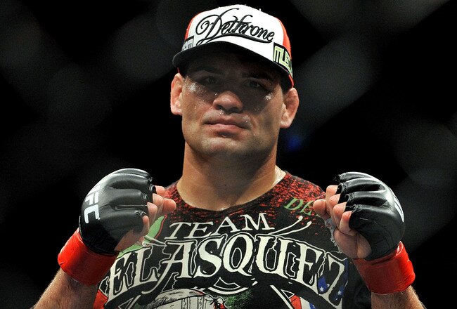 LOS ANGELES, CA - OCTOBER 24:  UFC fighter Cain Velasquez poses after his victory over UFC fighter Ben Rothwell (not pictured) in their Heavyweight bout at UFC 104: Machida vs. Shogun at Staples Center on October 24, 2009 in Los Angeles, California.  Velasquez won the fight by way of TKO.  (Photo by Jon Kopaloff/Getty Images)