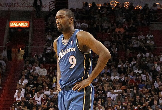 MIAMI, FL - NOVEMBER 29:  Gilbert Arenas #9 of the Washington Wizards looks on during a game against the Miami Heat at American Airlines Arena on November 29, 2010 in Miami, Florida. NOTE TO USER: User expressly acknowledges and agrees that, by downloading and/or using this Photograph, User is consenting to the terms and conditions of the Getty Images License Agreement.  (Photo by Mike Ehrmann/Getty Images)