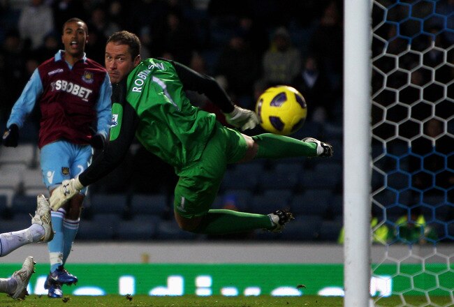 BLACKBURN, ENGLAND - DECEMBER 18:  Goalkepper Paul Robinson of Blackburn can not save the shotand goal by Junior Stanislas of West Ham during the Barclays Premier League match between Blackburn Rovers and West Ham United at Ewood park on December 18, 2010 in Blackburn, England.  (Photo by Dean Mouhtaropoulos/Getty Images)