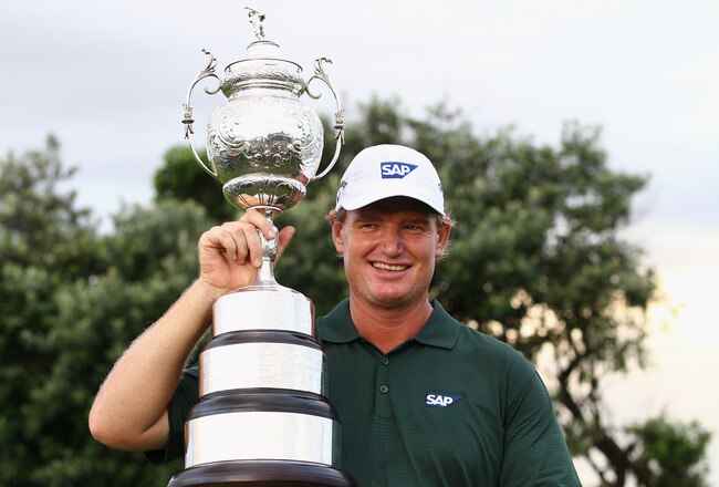 DURBAN, SOUTH AFRICA - DECEMBER 19:  Ernie Els of South Africa celebrates with the trophy after round four of the South African Open Golf Championship at the Durban Country Club on December 19, 2010 in Durban, South Africa.  (Photo by Julian Finney/Getty Images)