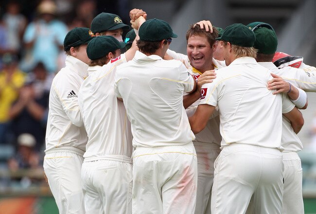 PERTH, AUSTRALIA - DECEMBER 19:  Ryan Harris of Australia is congratulated by teammates for the wicket of Matt Prior of England during day four of the Third Ashes Test match between Australia and England at the WACA on December 19, 2010 in Perth, Australia.  (Photo by Mark Dadswell/Getty Images)