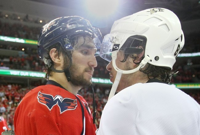 WASHINGTON - MAY 13:  Alex Ovechkin #8 of the Washington Capitals and Sidney Crosby #87 of the Pittsburgh Penguins shake hands after Pittsburgh's 6-2 victory in Game Seven of the Eastern Conference Semifinal  Round of the 2009 Stanley Cup Playoffs at Verizon Center on May 13, 2009 in Washington, DC.  (Photo by Bruce Bennett/Getty Images)