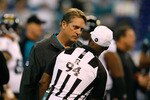 INDIANAPOLIS, IN - DECEMBER 19: Jack Del Rio of the Jacksonville Jaguars talks with Mike Carey #94 during pregame warm ups prior to the game against the Indianapolis Colts at Lucas Oil Stadium on December 19, 2010 in Indianapolis, Indiana.  (Photo by Scott Boehm/Getty Images)