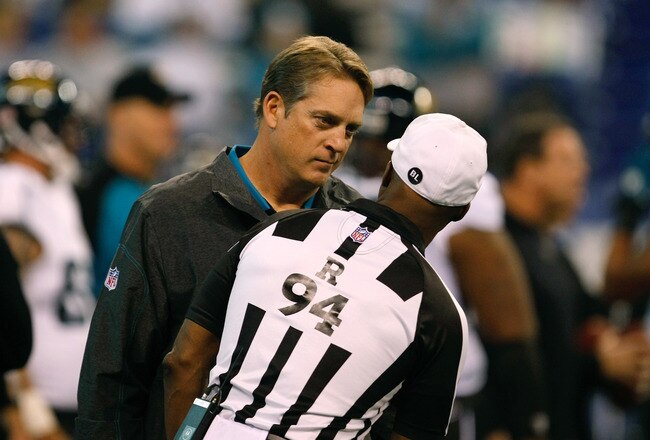 INDIANAPOLIS, IN - DECEMBER 19: Jack Del Rio of the Jacksonville Jaguars talks with Mike Carey #94 during pregame warm ups prior to the game against the Indianapolis Colts at Lucas Oil Stadium on December 19, 2010 in Indianapolis, Indiana.  (Photo by Scott Boehm/Getty Images)