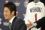 MINNEAPOLIS, MN - DECEMBER 18: Tsuyoshi Nishioka #1 of the Minnesota Twins speaks to members of the media during a press conference on December 18, 2010 at Target Field in Minneapolis, Minnesota. (Photo by Hannah Foslien/Getty Images)