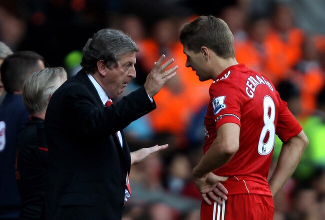 LIVERPOOL, ENGLAND - AUGUST 15:  Liverpool Manager Roy Hodgson issues instructions to Steven Gerrard during the Barclays Premier League match between Liverpool and Arsenal at Anfield on August 15, 2010 in Liverpool, England.  (Photo by Clive Brunskill/Getty Images)