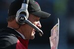 CHARLOTTE, NC - DECEMBER 19:  Head coach Ken Whisenhunt of the Arizona Cardinals calls a play against the Carolina Panthers during their game at Bank of America Stadium on December 19, 2010 in Charlotte, North Carolina.  (Photo by Streeter Lecka/Getty Images)