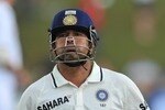 CENTURION, SOUTH AFRICA - DECEMBER 19: Sachin Tendulkar of India walks off after his unbeaten 50th Test century during day 4 of the 1st Test match between South Africa and India at SuperSport Park on December 19, 2010 in Centurion, South Africa.  (Photo by Duif du Toit/Gallo Images/Getty Images)