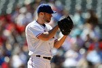 ARLINGTON, TX - SEPTEMBER 29:  Pitcher Rich Harden #40 of the Texas Rangers throws against the Seattle Mariners at Rangers Ballpark in Arlington on September 29, 2010 in Arlington, Texas.  (Photo by Ronald Martinez/Getty Images)