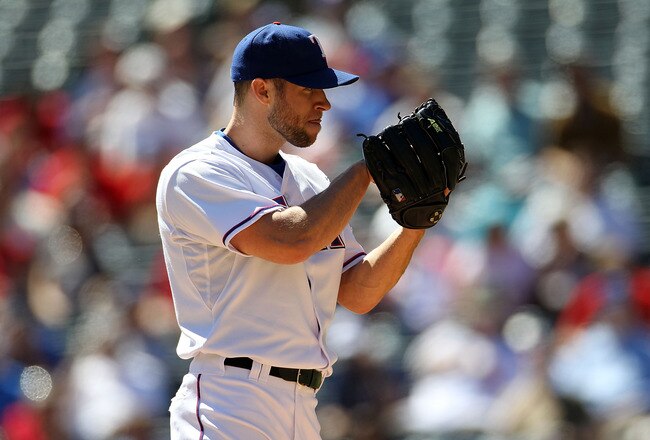ARLINGTON, TX - SEPTEMBER 29:  Pitcher Rich Harden #40 of the Texas Rangers throws against the Seattle Mariners at Rangers Ballpark in Arlington on September 29, 2010 in Arlington, Texas.  (Photo by Ronald Martinez/Getty Images)