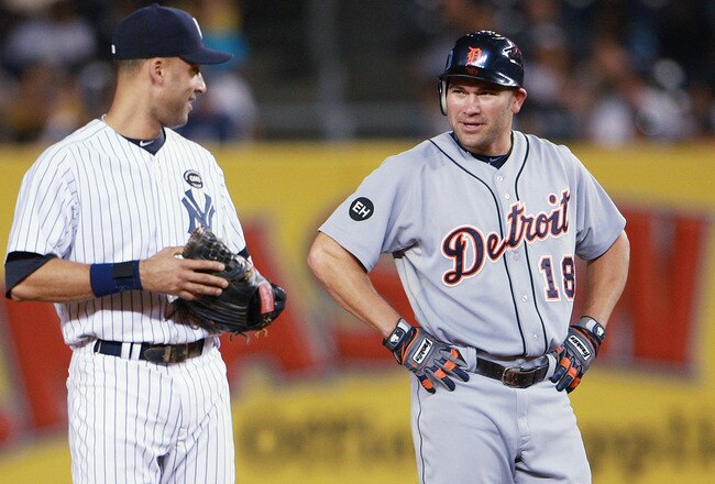 NEW YORK - AUGUST 18:  Johnny Damon #18 of the Detroit Tigers talks with Derek Jeter #2 of the New York Yankees during a game at Yankee Stadium on August 18, 2010 in the Bronx borough of New York City.  The Yankees won 9 - 5. (Photo by Andrew Burton/Getty Images)
