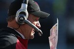 CHARLOTTE, NC - DECEMBER 19:  Head coach Ken Whisenhunt of the Arizona Cardinals calls a play against the Carolina Panthers during their game at Bank of America Stadium on December 19, 2010 in Charlotte, North Carolina.  (Photo by Streeter Lecka/Getty Images)