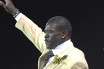 CANTON, OH - AUGUST 04: Michael Irvin waves to fans during the Class of 2007 Pro Football Hall of Fame Enshrinement Ceremony August 4, 2007 in Canton, Ohio. (Photo by Al Messerschmidt/Getty Images)