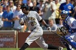 CHICAGO - JUNE 30: Lastings Milledge #85 of the Pittsburgh Pirates hits the ball against the Chicago Cubs at Wrigley Field on June 30, 2010 in Chicago, Illinois. The Pirates defeated the Cubs 2-0. (Photo by Jonathan Daniel/Getty Images)