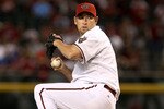 PHOENIX - APRIL 06:  Starting pitcher Brandon Webb #17 of the Arizona Diamondbacks pitches against the Colorado Rockies during the MLB openning day game at Chase Field on April 6, 2009 in Phoenix, Arizona.  The Diamondbacks defeated the Rockies 9-8. (Photo by Christian Petersen/Getty Images)