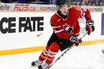 SASKATOON, SK - JANUARY 5:  Ryan Ellis #6 of Team Canada skates with the puck during the 2010 IIHF World Junior Championship Tournament Gold Medal game against Team USA on January 5, 2010 at the Credit Union Centre in Saskatoon, Saskatchewan, Canada.  Team USA defeated Team Canada 6-5 in overtime.(Photo by Richard Wolowicz/Getty Images)