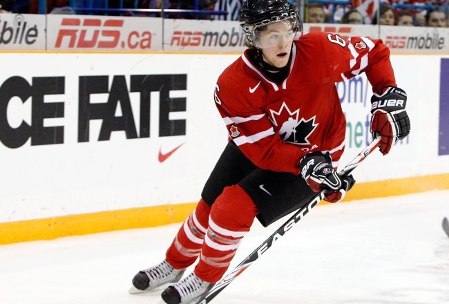 SASKATOON, SK - JANUARY 5:  Ryan Ellis #6 of Team Canada skates with the puck during the 2010 IIHF World Junior Championship Tournament Gold Medal game against Team USA on January 5, 2010 at the Credit Union Centre in Saskatoon, Saskatchewan, Canada.  Team USA defeated Team Canada 6-5 in overtime.(Photo by Richard Wolowicz/Getty Images)
