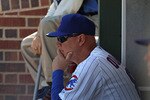 CHICAGO - SEPTEMBER 24: Interim manager Mike Quade #8 of the Chicago Cubs watches as his team takes on the St. Louis Cardinals at Wrigley Field on September 24, 2010 in Chicago, Illinois. The CArdinals defeated the Cubs 7-1. (Photo by Jonathan Daniel/Getty Images)