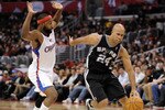 LOS ANGELES, CA - DECEMBER 01:  Richard Jefferson #24 of the San Antonio Spurs dribbles around Baron Davis #5 of the Los Angeles Clippers at the Staples Center on December 1, 2010 in Los Angeles, California.  NOTE TO USER: User expressly acknowledges and agrees that, by downloading and or using this photograph, User is consenting to the terms and conditions of the Getty Images License Agreement.  (Photo by Harry How/Getty Images)