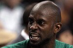 BOSTON, MA - DECEMBER 16:  Kevin Garnett #5 of the Boston Celtics talks on the bench in the first half against the Atlanta Hawks on December 16, 2010 at the TD Garden in Boston, Massachusetts. NOTE TO USER: User expressly acknowledges and agrees that, by downloading and/or using this Photograph, User is consenting to the terms and conditions of the Getty Images License Agreement.  (Photo by Elsa/Getty Images)
