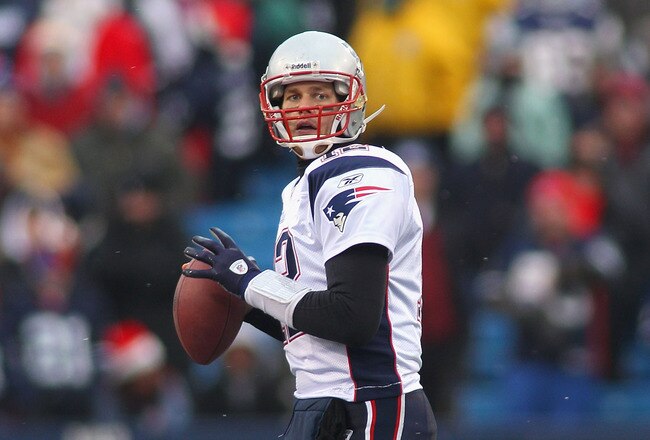 ORCHARD PARK, NY - DECEMBER 26:  Tom Brady #12 of the New England Patriots readies to throw a pass against the Buffalo Bills  at Ralph Wilson Stadium on December 26, 2010 in Orchard Park, New York.  New England won 34-3.  (Photo by Rick Stewart/Getty Images)
