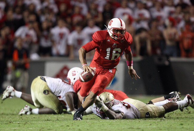 RALEIGH, NC - OCTOBER 28:  Russell Wilson #16 of the North Carolina State Wolfpack runs with the ball against the Florida State Seminoles during their game at Carter-Finley Stadium on October 28, 2010 in Raleigh, North Carolina.  (Photo by Streeter Lecka/Getty Images)