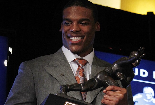 NEW YORK - DECEMBER 11:  Cam Newton, quarterback of the Auburn University Tigers, speaks after being awarded the 2010 Heisman Memorial Trophy Award on December 11, 2010 in New York City.  (Photo by Jeff Zelevansky/Getty Images)