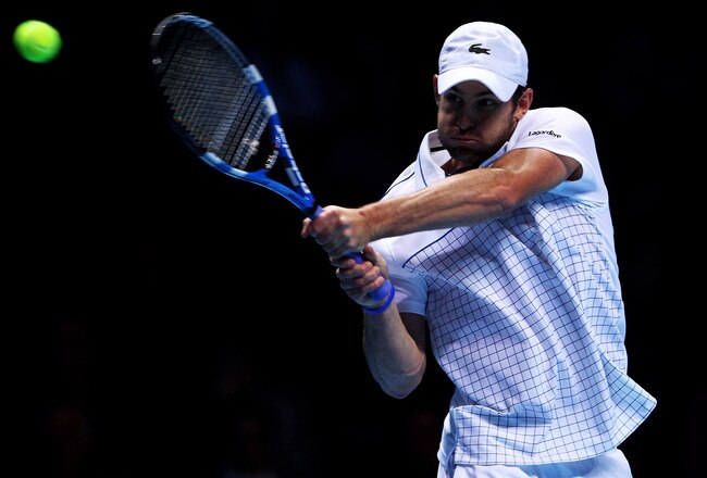 LONDON, ENGLAND - NOVEMBER 26:  Andy Roddick of the USA returns the ball during his men's singles match against Novak Djokovic of Serbia during the ATP World Tour Finals at O2 Arena on November 26, 2010 in London, England.  (Photo by Julian Finney/Getty Images)
