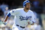 LOS ANGELES, CA - SEPTEMBER 01:  James Loney #7 of the Los Angeles Dodgers runs to first base against the Philadelphia Phillies at Dodger Stadium on September 1, 2010 in Los Angeles, California.  (Photo by Harry How/Getty Images)