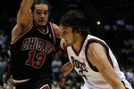 MILWAUKEE - NOVEMBER 30: Andrew Bogut #6 of the Milwuakee Bucks drives around Joakim Noah #13 of the Chicago Bulls at the Bradley Center on November 30, 2009 in Milwaukee, Wisconsin. The Bucks defeated the Bulls 99-97. NOTE TO USER: User expressly acknowledges and agrees that, by downloading and/or using this Photograph, User is consenting to the terms and conditions of the Getty Images License Agreement. (Photo by Jonathan Daniel/Getty Images)