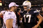 SAN DIEGO - NOVEMBER 22:  Quarterback Philip Rivers #17 of the San Diego Chargers and quarterback Tim Tebow #15 of the Denver Broncos talk after the game at Qualcomm Stadium on November 22, 2010 in San Diego, California. The Chargers won 35-14.  (Photo by Stephen Dunn/Getty Images)