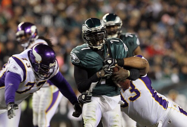 PHILADELPHIA, PA - DECEMBER 26:  Jamarca Sanford #33 of the Minnesota Vikings tackles Michael Vick #7 of the Philadelphia Eagles to cause a fumble in the 3rd quarter at Lincoln Financial Field on December 26, 2010 in Philadelphia, Pennsylvania.  (Photo by Jim McIsaac/Getty Images)
