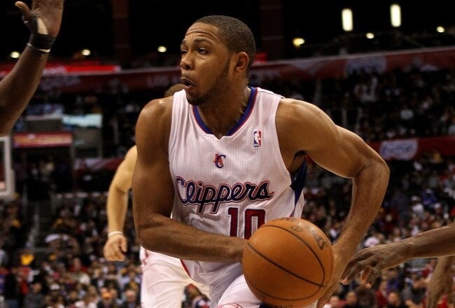 LOS ANGELES, CA - DECEMBER 08:  Eric Gordon #10 of the Los Angeles Clippers drives against the Los Angeles Lakers at Staples Center on December 8, 2010 in Los Angeles, California. The Lakers won 87-86.  NOTE TO USER: User expressly acknowledges and agrees that, by downloading and or using this photograph, User is consenting to the terms and conditions of the Getty Images License Agreement.  (Photo by Stephen Dunn/Getty Images)