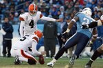 NASHVILLE, TN - DECEMBER 7:   Phil Dawson #4 of the Cleveland Browns kicks a field goal during the game against the Tennessee Titans on December 7, 2008 at LP Field in Nashville, Tennessee.  (Photo by Kevin C. Cox/Getty Images)