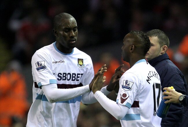 LIVERPOOL, ENGLAND - NOVEMBER 20:   Carlton Cole of West Ham United is substituted for Benni McCarthy (R) during the Barclays Premier League match between Liverpool and West Ham United at Anfield on November 20, 2010 in Liverpool, England. (Photo by Alex Livesey/Getty Images)