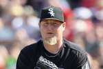 TEMPE, AZ - MARCH 12:  Relief pitcher Bobby Jenks #45 of the Chicago White Sox pitches against the Los Angeles Angels of Anaheim during the MLB spring training game at Tempe Diablo Stadium on March 12, 2010 in Tempe, Arizona.  The White Sox defeated the Angels 10-7.  (Photo by Christian Petersen/Getty Images)