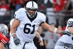 COLUMBUS, OH - NOVEMBER 13:  Stefan Wisniewski #61 of the Penn State Nittany Lions blocks against the Ohio State Buckeyes at Ohio Stadium on November 13, 2010 in Columbus, Ohio.  (Photo by Jamie Sabau/Getty Images)