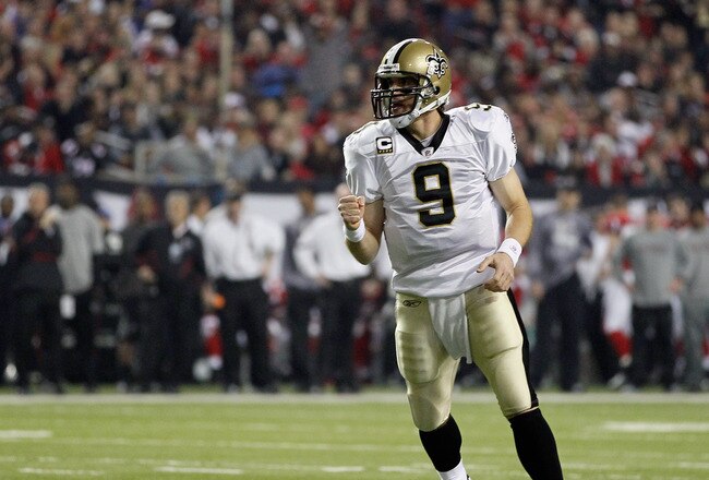 ATLANTA, GA - DECEMBER 27:  Quarterback Drew Brees #9 of the New Orleans Saints celebrates a touchdown pass in the first half during the game against the Atlanta Falcons at the Georgia Dome on December 27, 2010 in Atlanta, Georgia.  (Photo by Kevin C. Cox/Getty Images)