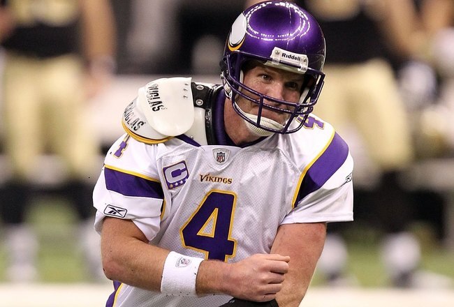 NEW ORLEANS - JANUARY 24:  Brett Favre #4 of the Minnesota Vikings picks himself off the turf against the New Orleans Saints during the NFC Championship Game at the Louisana Superdome on January 24, 2010 in New Orleans, Louisiana. The Saints won 31-28 in overtime. (Photo by Ronald Martinez/Getty Images)