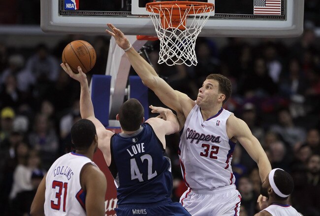 LOS ANGELES, CA - DECEMBER 20:  Blake Griffin #32 of the Los Angeles Clippers defends against Kevin Love #42 of the Minnesota Timberwolves during the second half at Staples Center on December 20, 2010 in Los Angeles, California. The Clippers defeated the Timberwolves 113-90. NOTE TO USER: User expressly acknowledges and agrees that, by downloading and or using this photograph, User is consenting to the terms and conditions of the Getty Images License Agreement.  (Photo by Jeff Gross/Getty Images)
