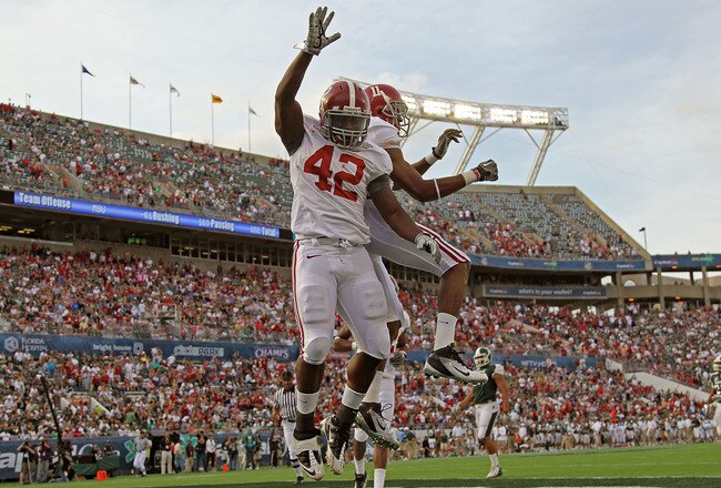ORLANDO, FL - JANUARY 01:  Eddie Lacy #42 of the Alabama Crimson Tide celebrates after rushing for a touchdown during the Capitol One Bowl against the Michigan State Spartans at the Florida Citrus Bowl on January 1, 2011 in Orlando, Florida.  (Photo by Mike Ehrmann/Getty Images)