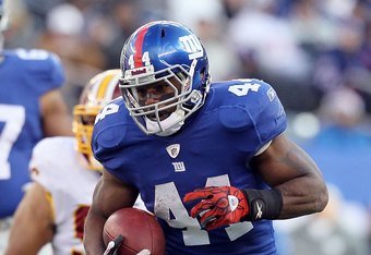 EAST RUTHERFORD, NJ - DECEMBER 05:  Ahmad Bradshaw #44 of the New York Giants runs the ball against the Washington Redskins on December 5, 2010 at the New Meadowlands Stadium in East Rutherford, New Jersey. The Giants defeated the Redskins 31-7.  (Photo by Jim McIsaac/Getty Images)